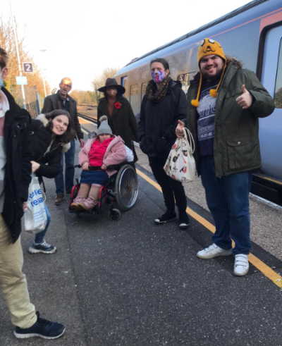 TouchBase members at the train station