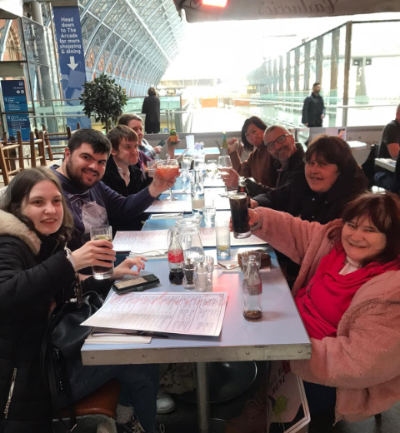 TouchBase members celebrate with a meal together in London
